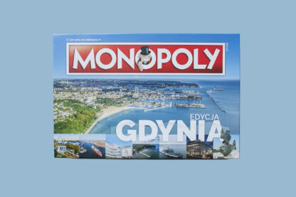 Okładka. Napis: Monopoly edycja Gdynia. W tle panorama Gdyni z lotu ptaka.